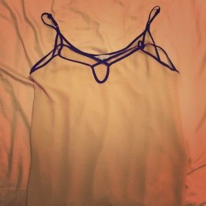 pink blouse with black skinny straps